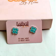 silver flower studs