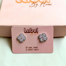 silver flower studs