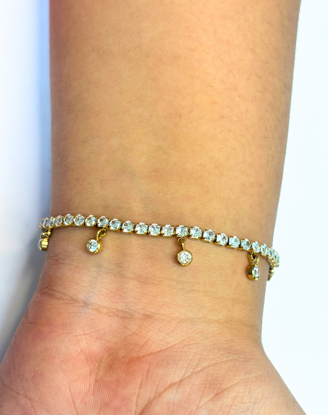 Charm tennis bracelet