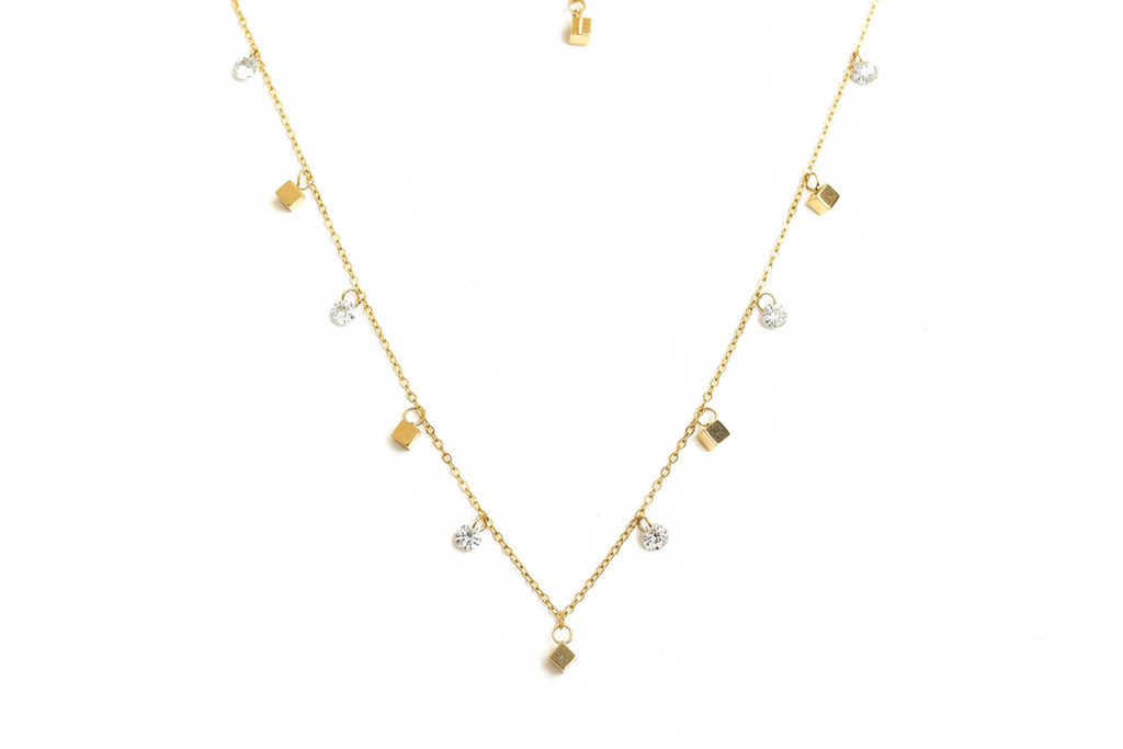 Gold Charm Necklace on White Background