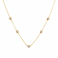 Gold Flower Charm Necklace - White Background Product Photo