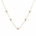 Gold Flower Charm Necklace - White Background Product Photo